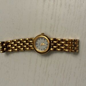 Armitron Gold Watch with White Roman Dial